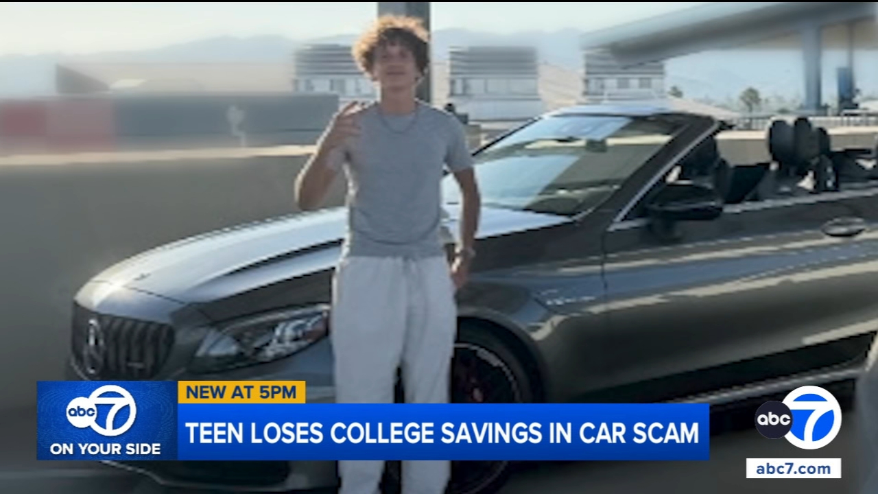 Arrod Berjis standing beside his empty driveway where his car once was.